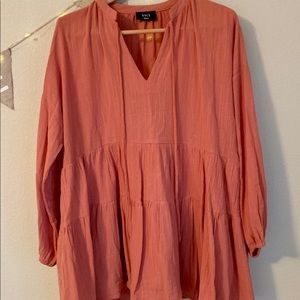 Clay colored tunic, sized small.